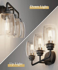 Split image showing Three Light Black Vanity Light Fixtures Over Mirror With Clear Glass Shades, both up and down light options.