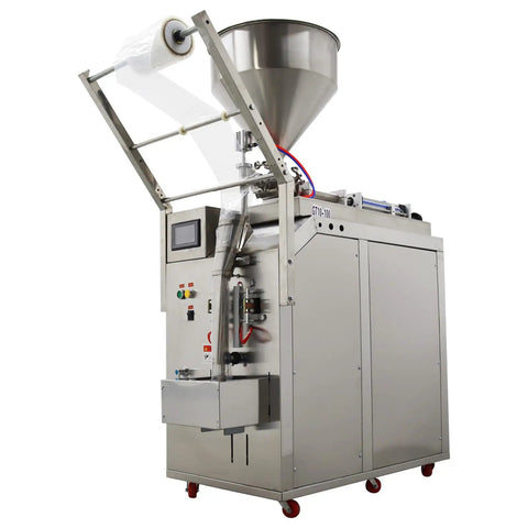 Automatic Quantitative Filling Machine For Paste Liquid And Granule Packaging With Built In Bag Maker And Tight Seal Design 10 To 100 Ml Capacity Smooth Operator Zero Fuss Packager 110v in a stainless steel design with funnel.
