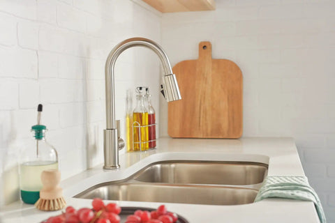 Flute Pull-Down Kitchen Faucet With POWERINSE Technology, Stainless Steel, 3-Function Spray, high arc gooseneck in modern kitchen.