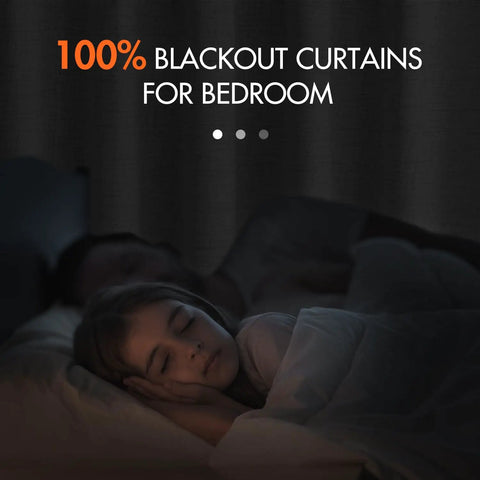 Child sleeping in dark room with Light Grey 100 Percent Blackout Curtains, 2 Panels Set, 72 Inches Long by 52 Inches Wide Per Panel.