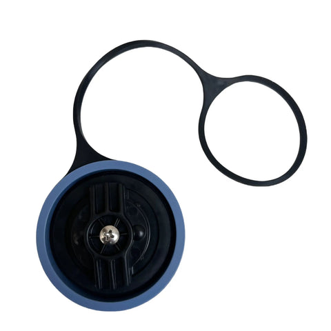 Heavy Duty Diesel Exhaust Fluid DEF Cap For Kenworth And Peterbilt Trucks A Must Have For Truckers Compatible With C500 T2000 T660 T680 T800 W900 210 320 330 335 337 362 365 384 387 388 OE 908-0223-01 showing top view with attached rubber tether.