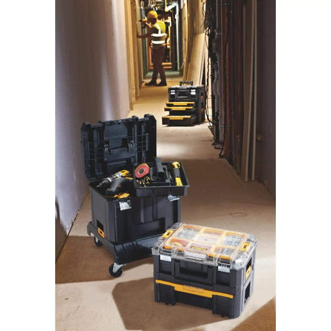 Tool Storage Organizer Cart For TSTAK System with Heavy Duty Wheels shown in a job site hallway with tools inside and on top