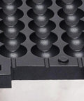 Detail of the waffle mold of the Slap Together Delicious Treats With This Commercial 1800W Bubble Skewer Waffle Ball Machine.