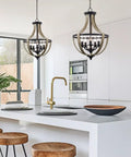 Five Light Rustic Modern Foyer Chandelier With Reclaimed Oak Wood Finish And Black Metal Frame Delivers Warm Ambient Dope Farmhouse Vibe For Entryway Or Dining Room hanging above kitchen island.