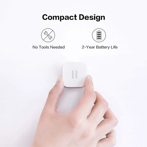 Hand holding Zigbee Vibration Sensor And Glass Break Detector For Home Security, Wireless Mini Alarm Sensor