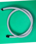 No Fuss Heavy Duty Garment Steamer Hose Replacement for High Temp Use Flexible PVC Nylon Tube coiled on green background