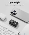 4K Streaming Webcam for PC and Mac With All Metal Unibody, Sony One-Half Inch Sensor, PDAF shown beside gadgets on a desk