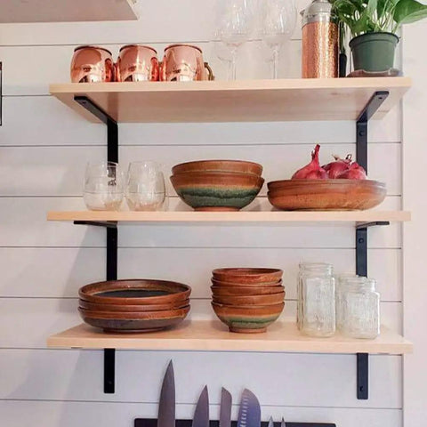 12 Inch L Shelf Brackets Set of 4 Heavy Duty Metal Black Rustic Industrial Shelving Brackets With Hardware Included supporting shelves.