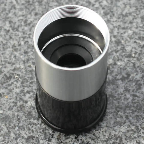 Close-up of a 0.965 inch eyepiece from the Universal 3 Piece 24.5mm Telescope Eyepiece Set with multi-coated lens.