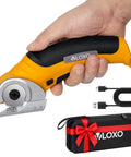 Beefy Cordless Electric Scissors With Safety Lock 4.2V Rechargeable Box Cutter 240 RPM Cutting Power in use with storage box and charger visible