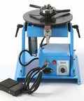 Battle Ready Mini Rotary Welding Turntable With Click Free Stepless Speed Tweaks And Rock Steady Zero To Ninety Degree Tilt Base in blue.