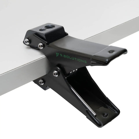 Savior Spring Clamp Mini Fast Mount Torsion Clamp with black anodized aluminum finish mounted on table edge