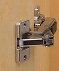 Close-up of Bi-Fold Hinge Pair For Frameless Cabinets With 60 Degree Clip Top Screw-On Self-Closing Cam Mounting Plate in use.