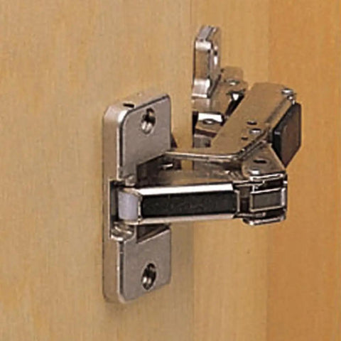 Close-up of Bi-Fold Hinge Pair For Frameless Cabinets With 60 Degree Clip Top Screw-On Self-Closing Cam Mounting Plate in use.