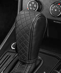 Solid Kick Upgrade For Your Ride Using This Clean Black Leather Car Gear Shift Knob Cover on gear lever in car interior.