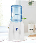 Portable Ice-Cold Water Dispenser For Countertop Bottled Water, Durable PP Construction, Built-In Tap For Easy Pour in a kitchen