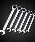 Nine Piece Spanner And Ratchet Wrench Set, Universal Socket Head Tools, chrome vanadium wrenches on dark background