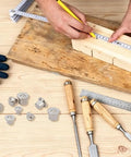 72 Pc Stainless Steel Dowel Center Pins Set Four Sizes for woodworking, with tools and wood in background, showcasing precise marking
