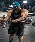 Man using Arm Blaster For Biceps And Triceps Isolation Dumbbell And Barbell Curl Support To Lock Your Elbows Improve Form And Build Them Guns Fast