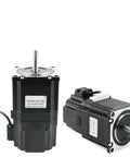 Two NEMA 23 stepper motors with black housings and silver shafts.
