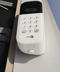 Two Piece Security Quick Thumb Screws Designed For MyQ Smart Garage Door Video Keypad attached to exterior wall.