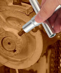 Heavy Duty Folding Socket Wrench Set Featuring Four Precision Cut Openings For Tight Squeezes And Faucet Repair solid steel socket in use on machinery.