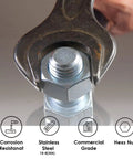 Close-up of a wrench tightening a 1/4-20 Nylon Insert Lock Nut Set Of 100 Stainless 304 Hex Lock Nuts With Nylon Insert, used on metal.