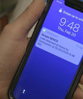 Smart Water Leak And Freeze Detector With WiFi Alerts, 80dB Audible Alarm notification shown on smartphone screen.