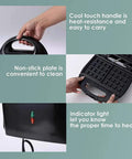 User holding cool touch handle of 3 In 1 Breakfast Maker With Interchangeable Plates Electric Sandwich Waffle And Steak Press Stainless Steel Non Stick Coating 110V For Home Kitchen Quick And Easy Meal Prep For Busy Mornings.