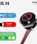 Built Tough Three Pack 12mm Momentary Push Button Switch With Bright Green Led Indicator And IP67 Waterproof Rating Featuring Pre Wired Leads For Straightforward Hookup On 12V Or 24V DC Panels, close-up view of black switch with red ring and wires.