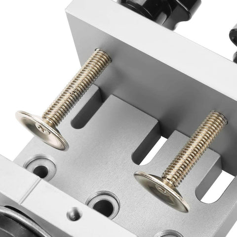 Close-up of Three In One Dowel Jig Kit with Self Centering Dowel Jig, Drill Locator and Adjustable Drill, metal components visible.