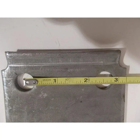 Beefed Up Heavy Duty Trailer U Bolt Kit For Three Inch Inside Width And Seven And A Quarter Inch Inside Length With Nine Sixteenth Inch Fine Thread For Five Point Two K To Seven K Axles And Aftermarket Suspension Hardware steel tie plate with tape measure showing 3-inch width