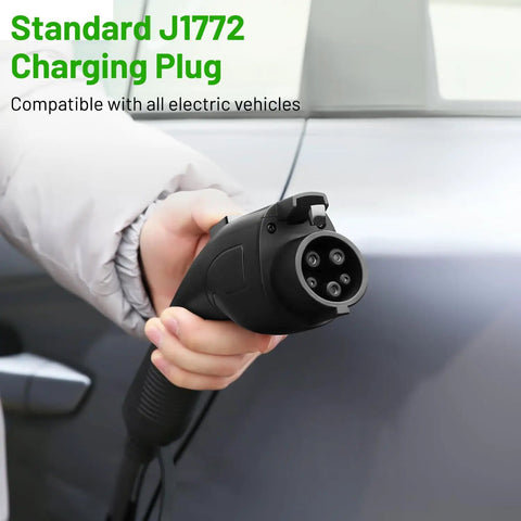 Person holding Standard J1772 plug of Level 2 EV Charger For Home Use Up To 48 Amp 240V Indoor Outdoor Fast Charging Station With App And WiFi Enabled EVSE Hardwired Electric Car Charger That Works Smoothly With All EV Models