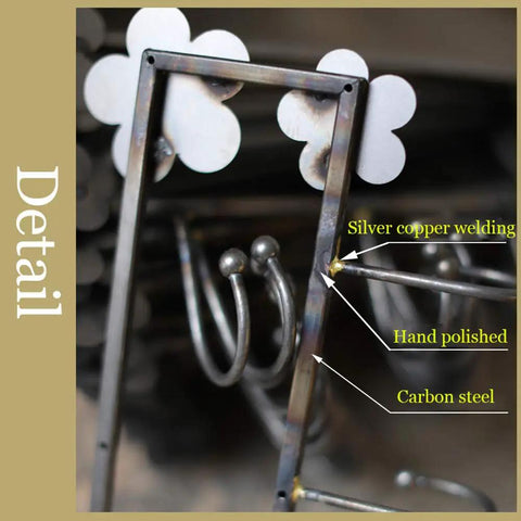 Close-up detail of Rugged Retro Wall Coat Rack Carbon Steel Hooks, highlighting hand-polished finish and silver copper welding.