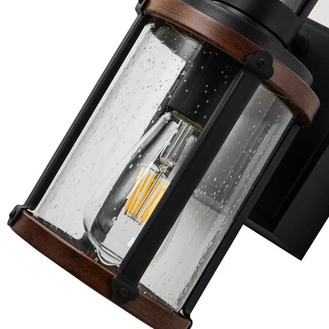 Outdoor Motion Sensor Lights With GFCI Outlet, Dusk To Dawn Exterior Wall Mount Sconce, close-up of seeded glass and bulb