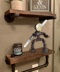 Robot Pipe Table Lamp With Rustic Industrial Style Two Light Edison Bulb Desk Light in bathroom on wooden shelf