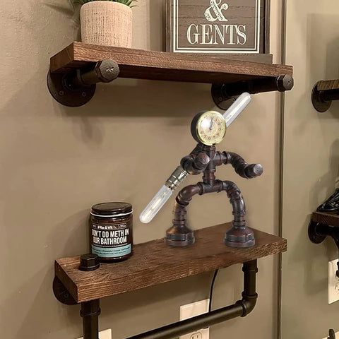 Robot Pipe Table Lamp With Rustic Industrial Style Two Light Edison Bulb Desk Light in bathroom on wooden shelf