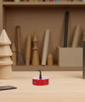 Bi Metal Hole Saw Kit For Four And A Quarter Inch with drill bit on a workbench with wooden tools in the background.