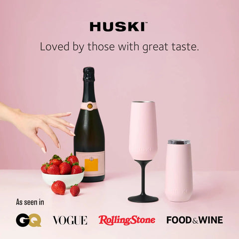 Top Tier Insulated Champagne Flute With Detachable Stem And Secure Lid Premium Stainless Steel Tumbler keeps your bubbly ice cold next to champagne and strawberries.