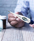 Digital Thermometer With Rigid Tip Quick 10 Second Reading For Oral Rectal And Underarm Use Beep At Peak No Fuss Memory shown in hand