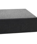 Close-up view of Beefy 25Kg Granite Parasol Base With Locking Bolts And Adapter, showing smooth black granite corner detail.