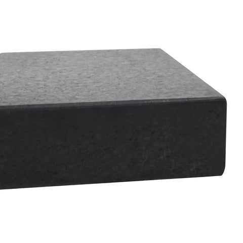 Close-up view of Beefy 25Kg Granite Parasol Base With Locking Bolts And Adapter, showing smooth black granite corner detail.