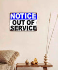 Notice Out Of Service Metal Sign 8x12 Inch Funny Aluminum Wall Decor for Office and Workplace on beige wall above shelf