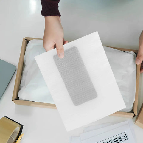 White EPE Foam Pouches 100 Pack Cushioned Wrap Bags For Shipping Glassware And Ceramics in hand during packaging