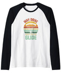 Why Drive When You Can Glide Paragliding Raglan Baseball Tee with black sleeves, featuring colorful paragliding graphic for aviation fans.