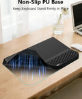 2-In-1 Ergonomic Keyboard Stand With Built-In Wrist Rest For All-Day Comfort, Black PU base on wooden desk