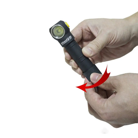 Wizard Pro V3 XHP50 Warm USB Magnetic Headlamp With 2300 Lumens shown being adjusted by hand
