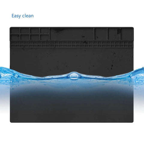 Black heat resistant soldering mat silicone repair workbench pad 932 F for electronics repair, shown submerged in water