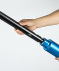 Hand holding Rock Solid 12 Inch Extension Adapter For Diamond Core Drill Bits With 1 1 4 By 7 Thread Rig Ready Coupler.