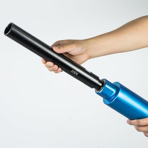 Hand holding Rock Solid 12 Inch Extension Adapter For Diamond Core Drill Bits With 1 1 4 By 7 Thread Rig Ready Coupler.